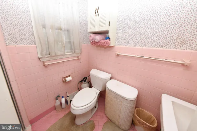 a view of a patio with table and chairs with wooden floor