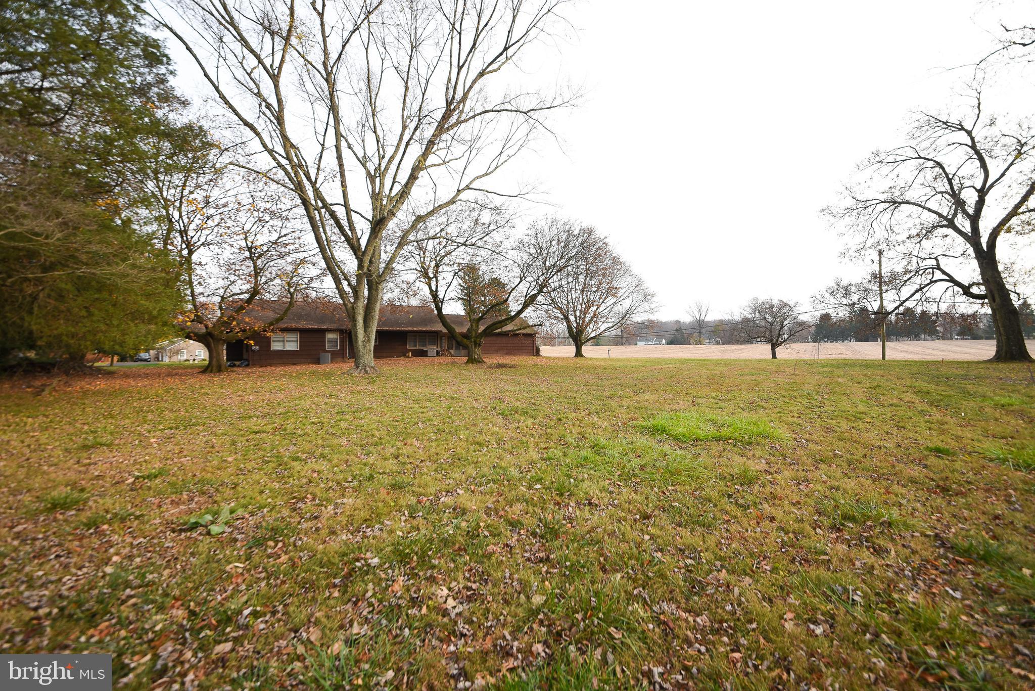 1 Sunnyside Lane Yardley, PA 19067 - Photo 37 of 39 a view of yard with swimming pool and green space