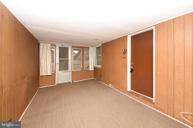 an empty room with windows