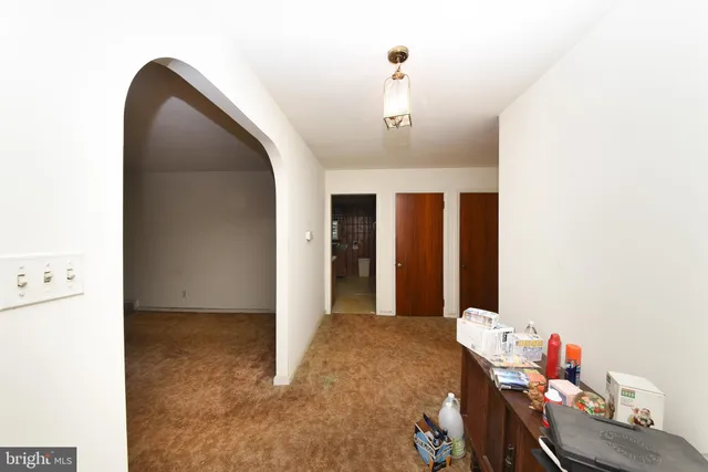 a view of livingroom with furniture and toys