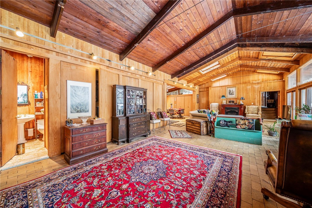 13610 Sperry Road Novelty, OH 44072 - Photo 7 of 42 This view of the great room shows office space, or secondary sitting room, large bedroom off this area. Hallway full bath. All rooms have amazing wood detail