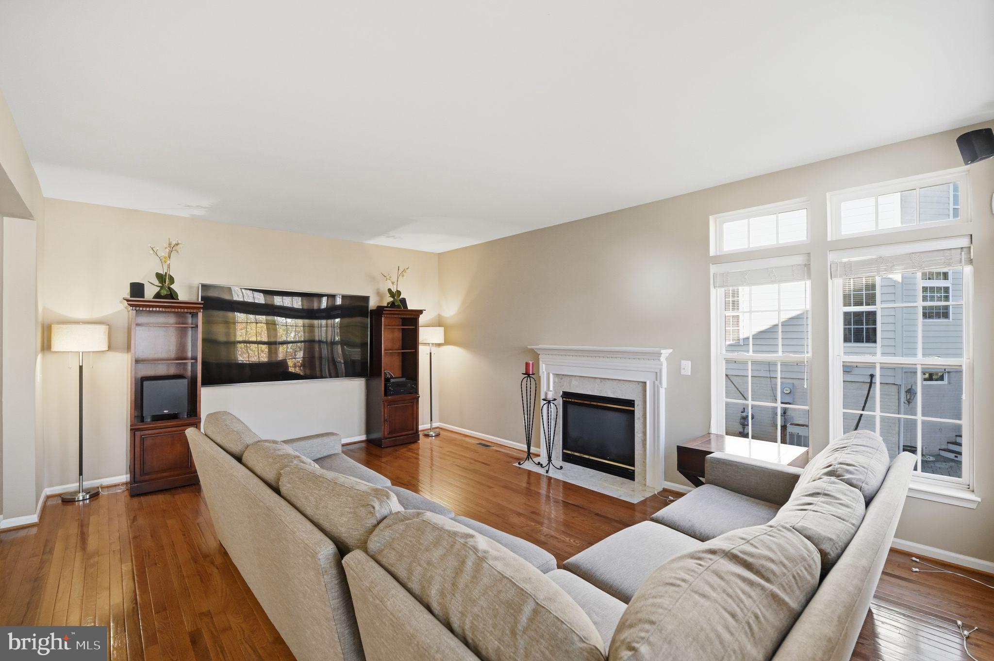 6837 Rathbone Place Gainesville, VA 20155 - Photo 13 of 44 Cozy and over Spacious Family Room with Fireplace