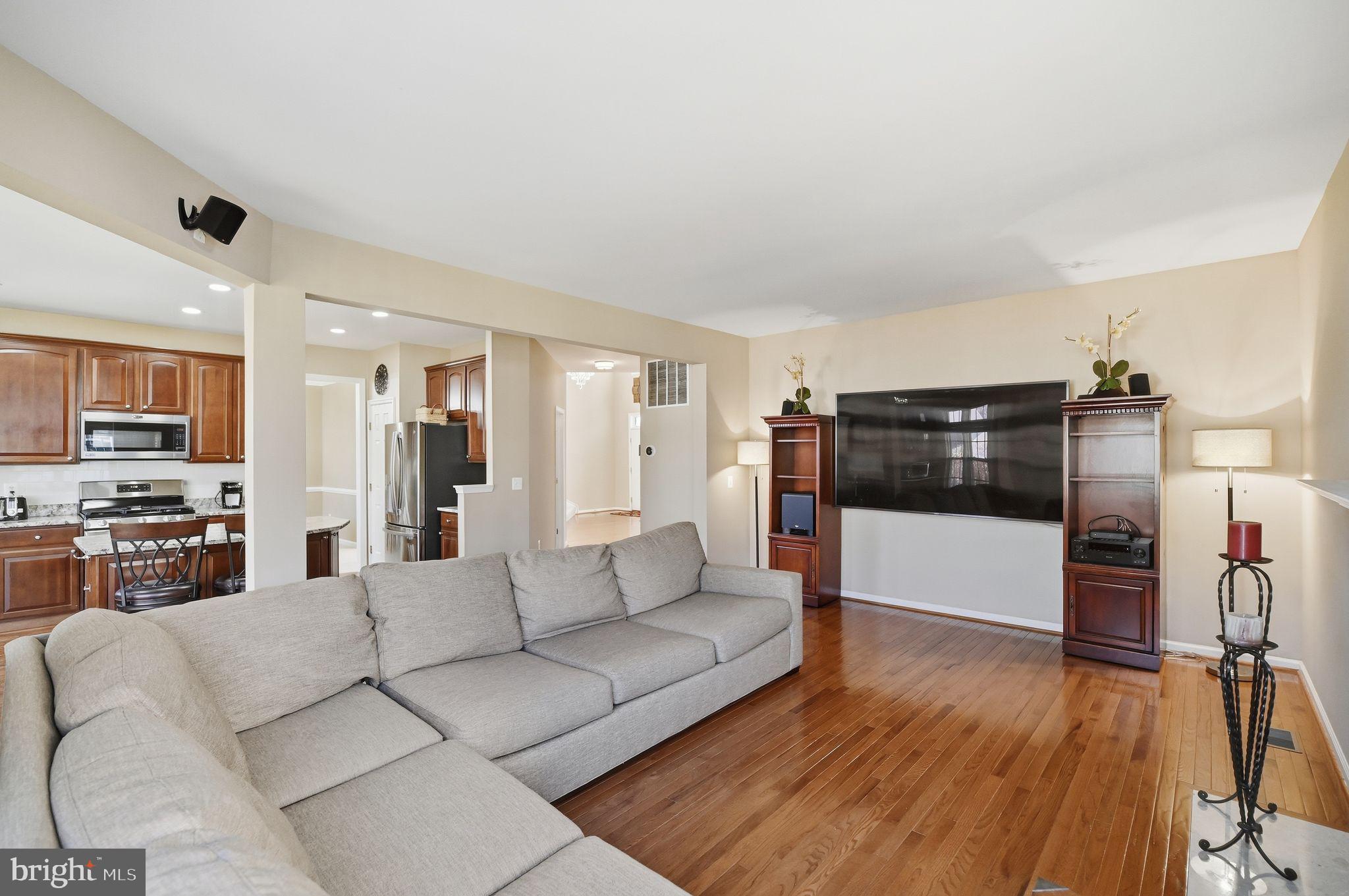 6837 Rathbone Place Gainesville, VA 20155 - Photo 14 of 44 Cozy and over Spacious Family Room with Fireplace