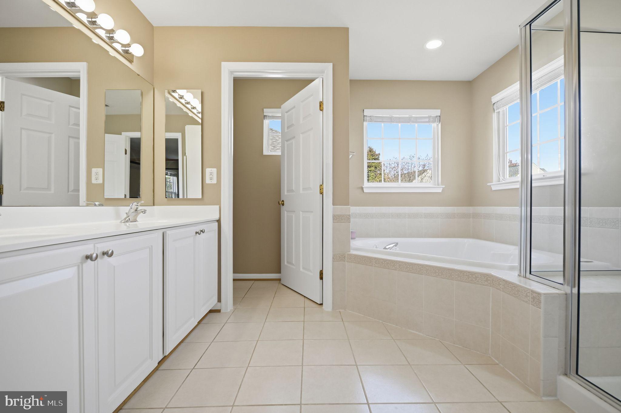 6837 Rathbone Place Gainesville, VA 20155 - Photo 18 of 44 Luxurious bath with separate shower & double sink