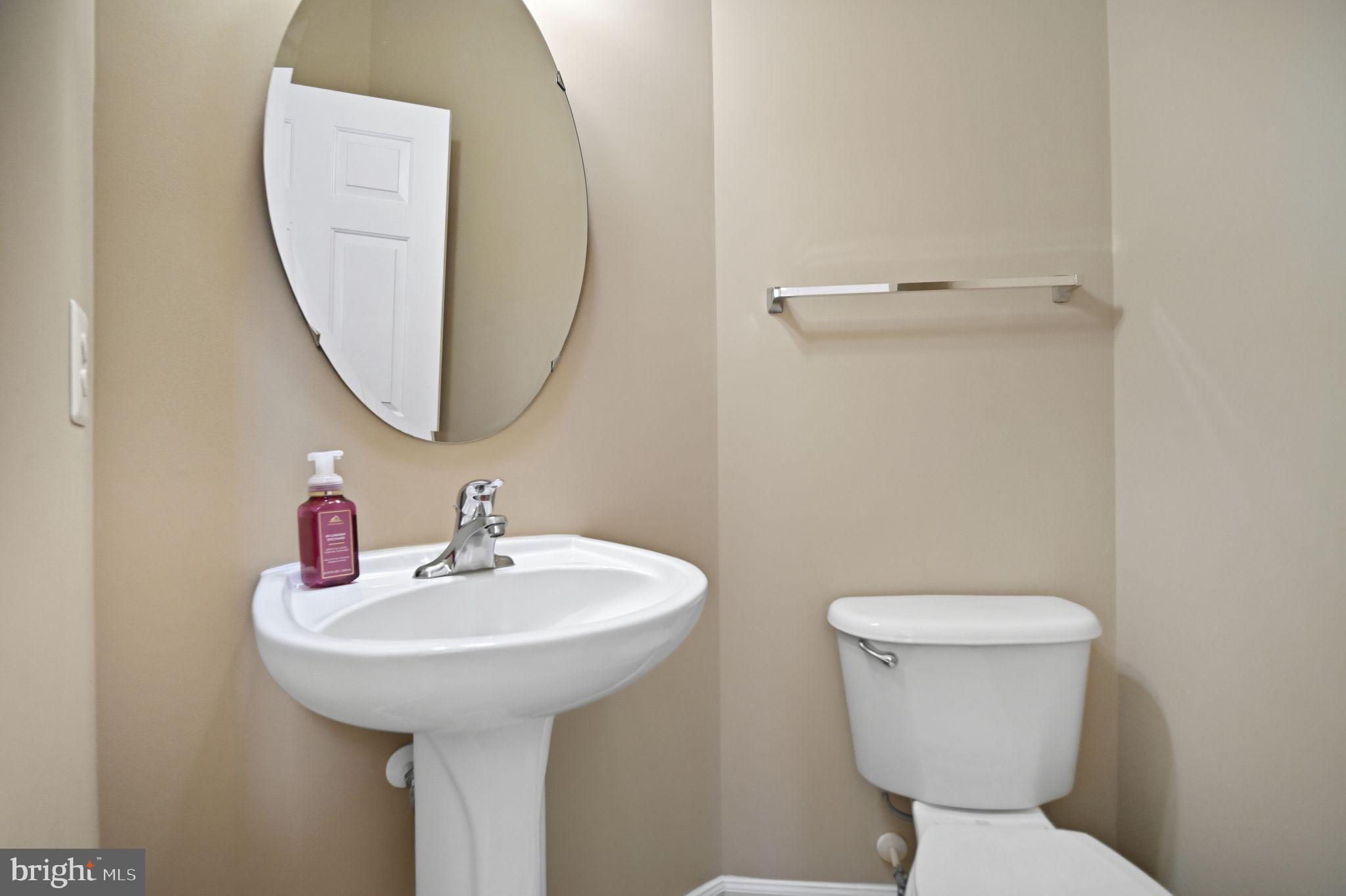 6837 Rathbone Place Gainesville, VA 20155 - Photo 22 of 44 Powder room on main level