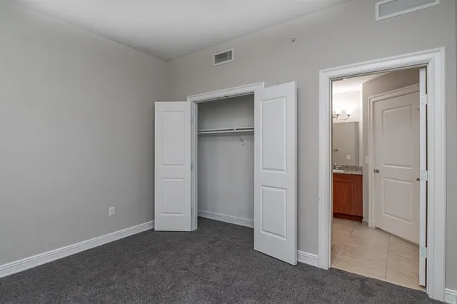 wooden floor and closet in a room