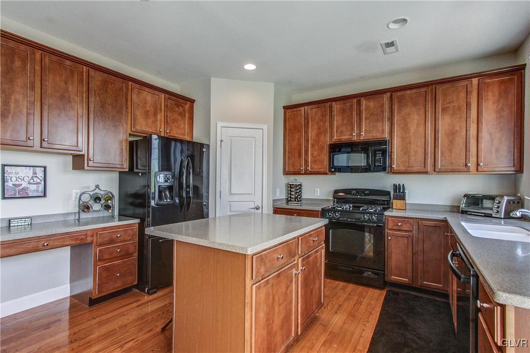 8935 Pathfinder Road Breinigsville, PA 18031 - Photo 27 of 50 Kitchen view towards corner pantry