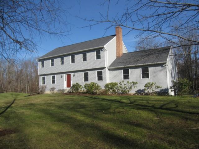 60 Bridle Trail Ridgefield, CT 06877 - Photo 1 of 1 a front view of a house with a garden
