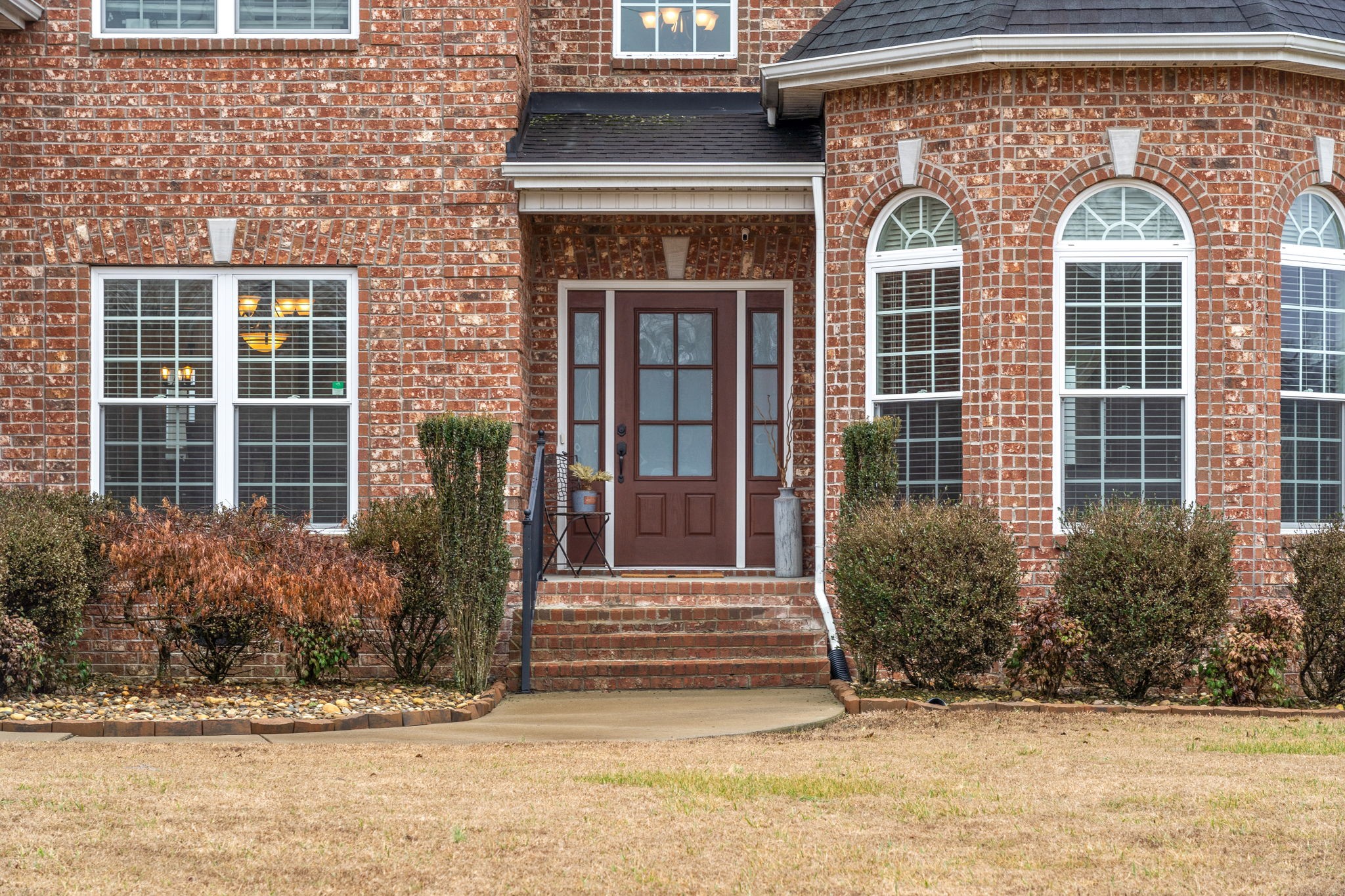 3927 Rowland Road Murfreesboro, TN 37128 - Photo 4 of 57 a front view of a house with garden