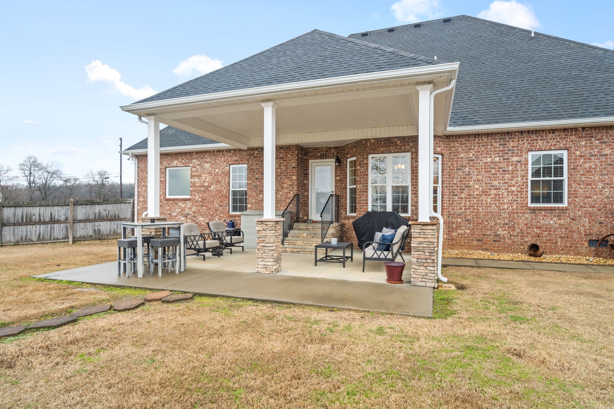 3927 Rowland Road Murfreesboro, TN 37128 - Photo 42 of 57 a view of a patio with a table and chairs