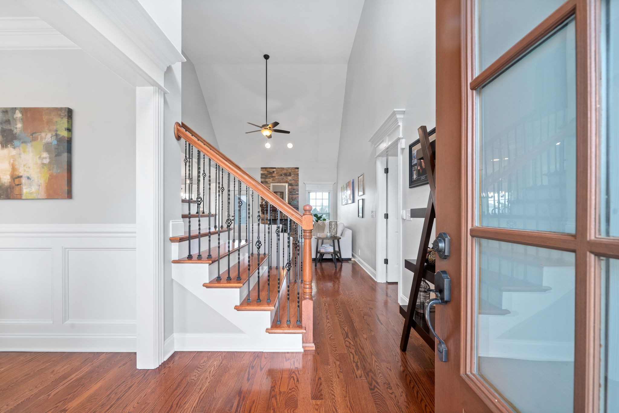 3927 Rowland Road Murfreesboro, TN 37128 - Photo 5 of 57 a view of staircase with wooden floor and a window