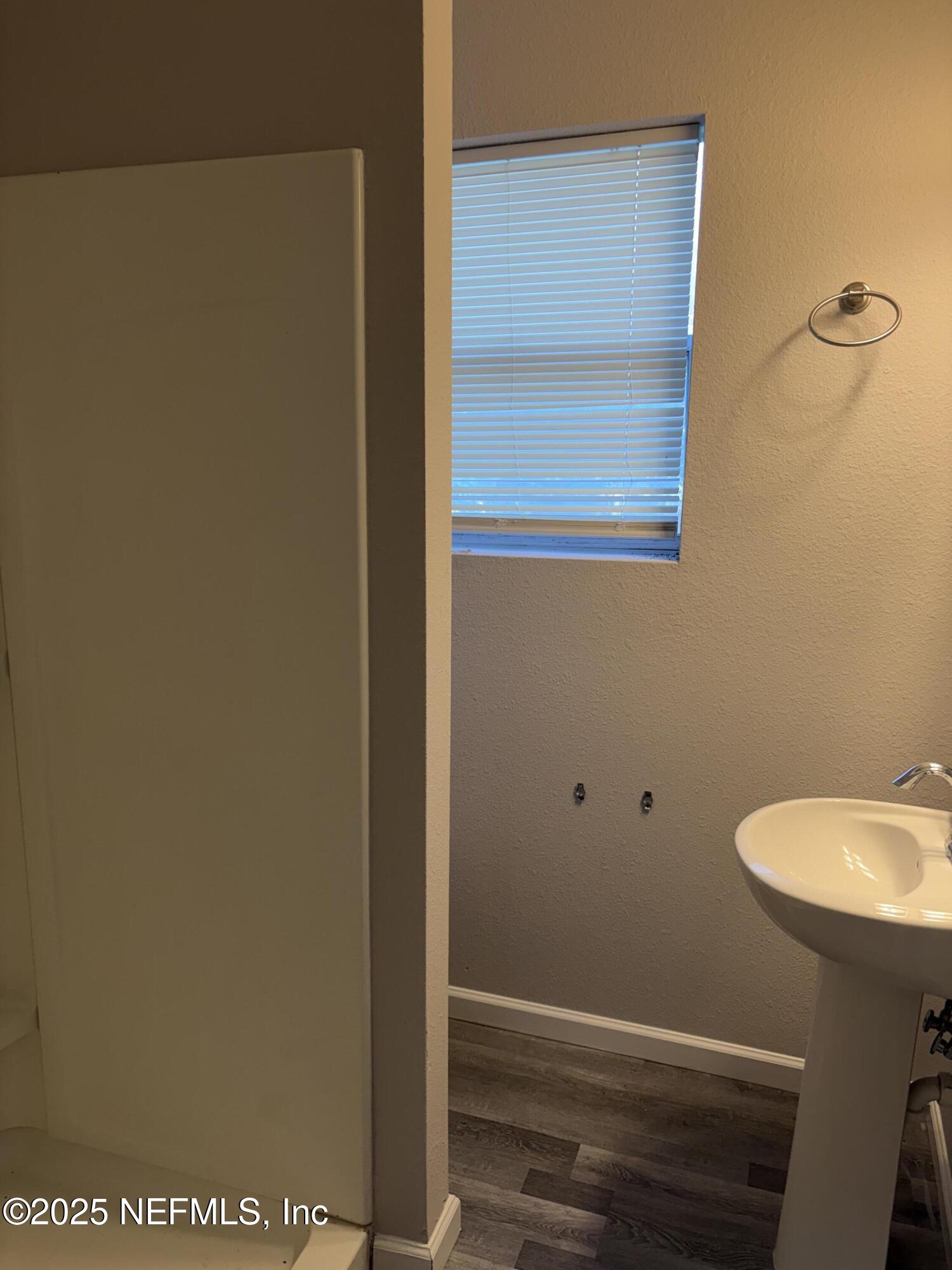 4444 Rainer Road Jacksonville, FL 32210 - Photo 11 of 19 a bathroom with a shower