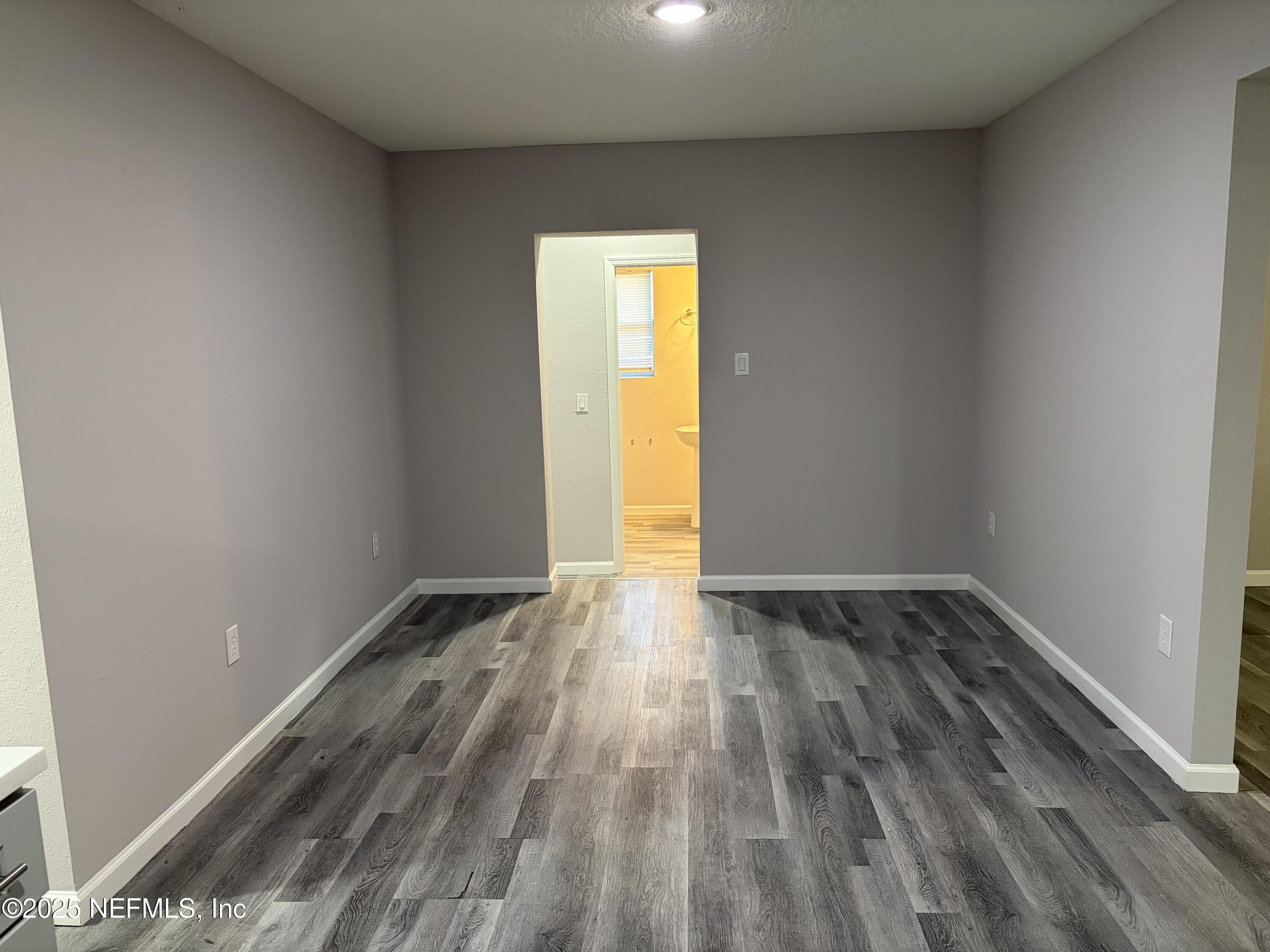 4444 Rainer Road Jacksonville, FL 32210 - Photo 6 of 19 a view of an empty room and window