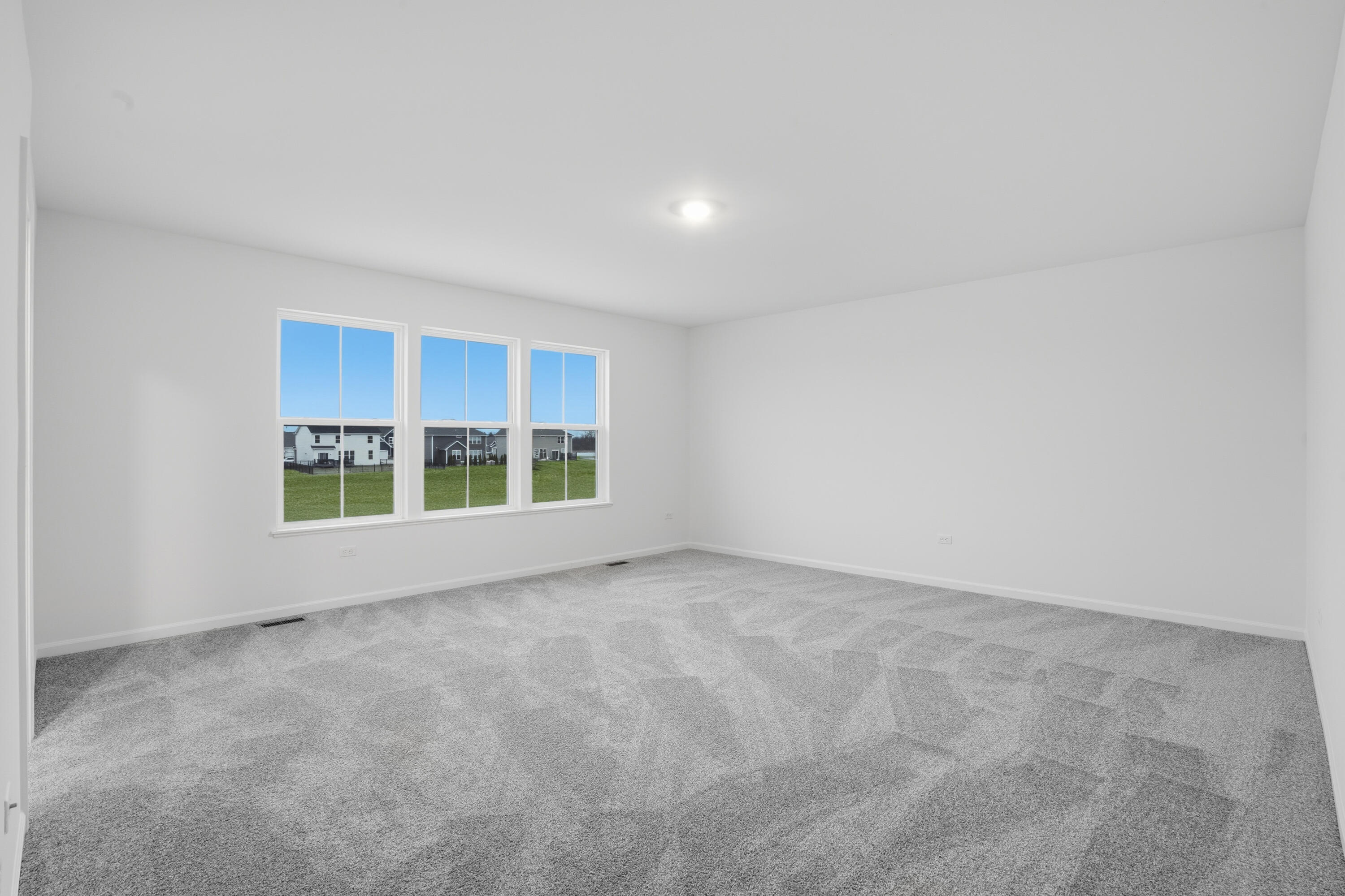 5970 East 112th Place Winfield, IN 46307 - Photo 6 of 57 a view of an empty room with a window