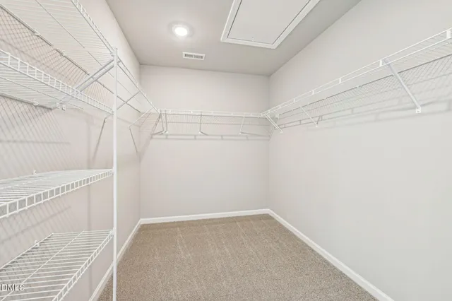 a view of a room with racks on the wall