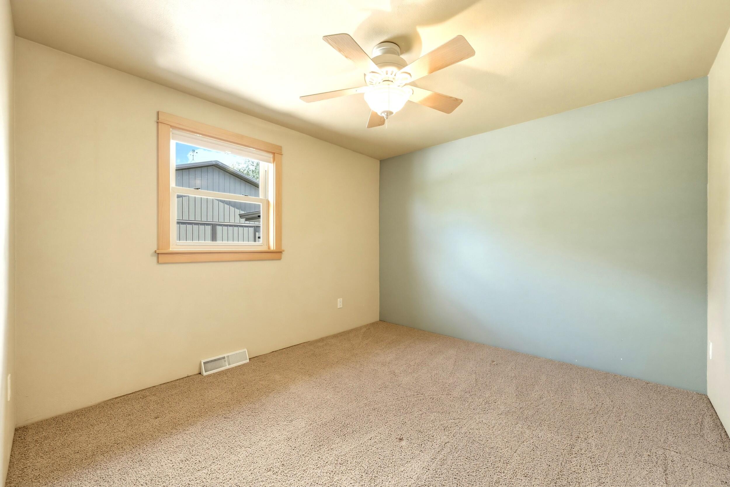 157 Upper Prairie Dog Road Banner, WY 82832 - Photo 46 of 71 147 Upstairs bedroom 2