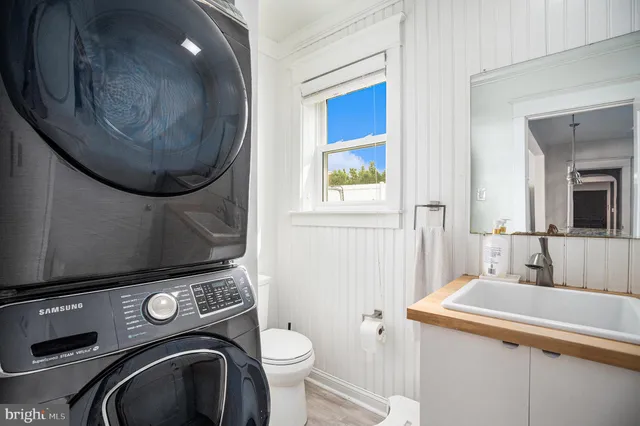 a bathroom with a toilet and a sink