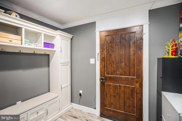 a bathroom with a shower and a sink