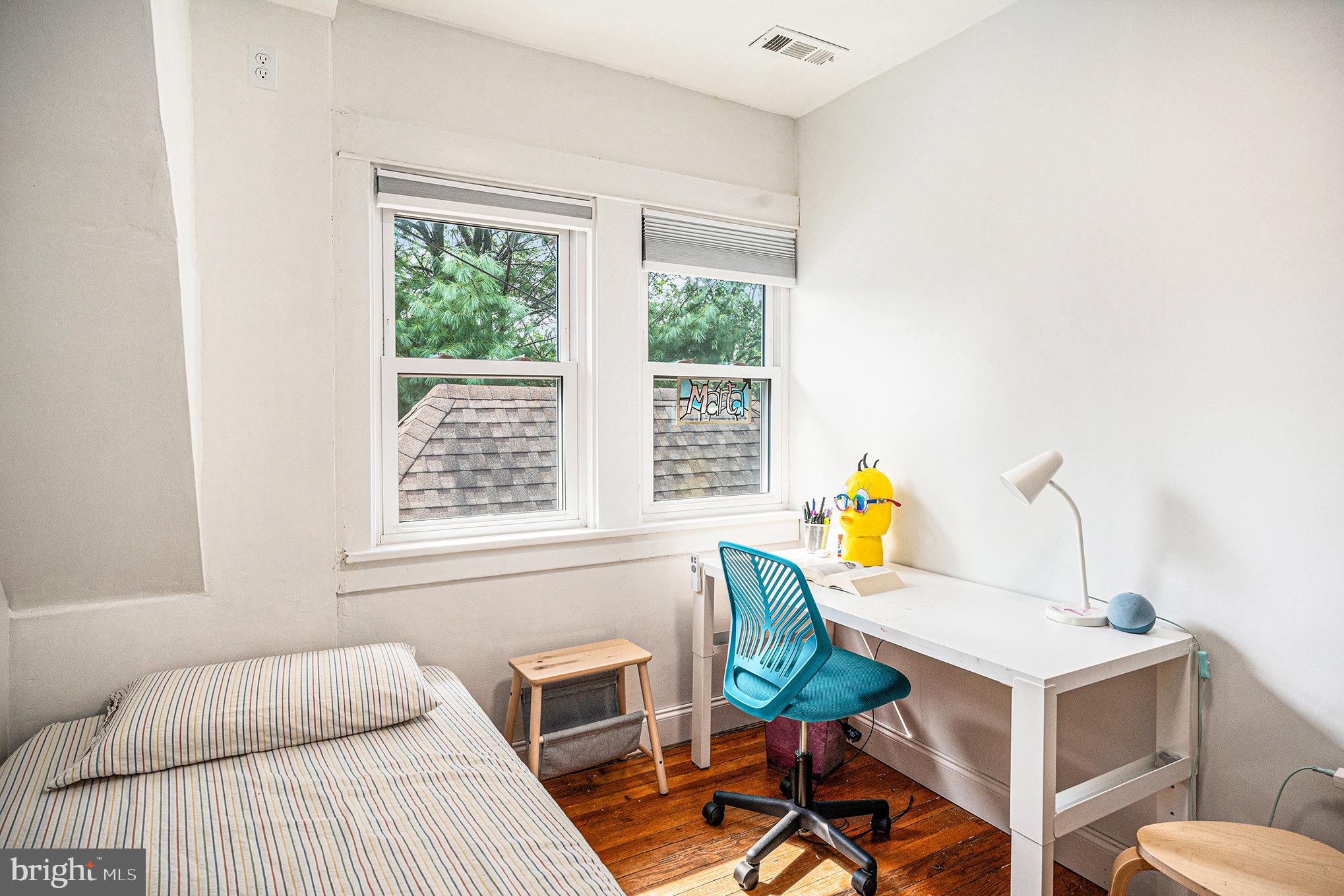 7238 Hollywood Road Fort Washington, PA 19034 - Photo 13 of 27 a bedroom with a bed a table and chair