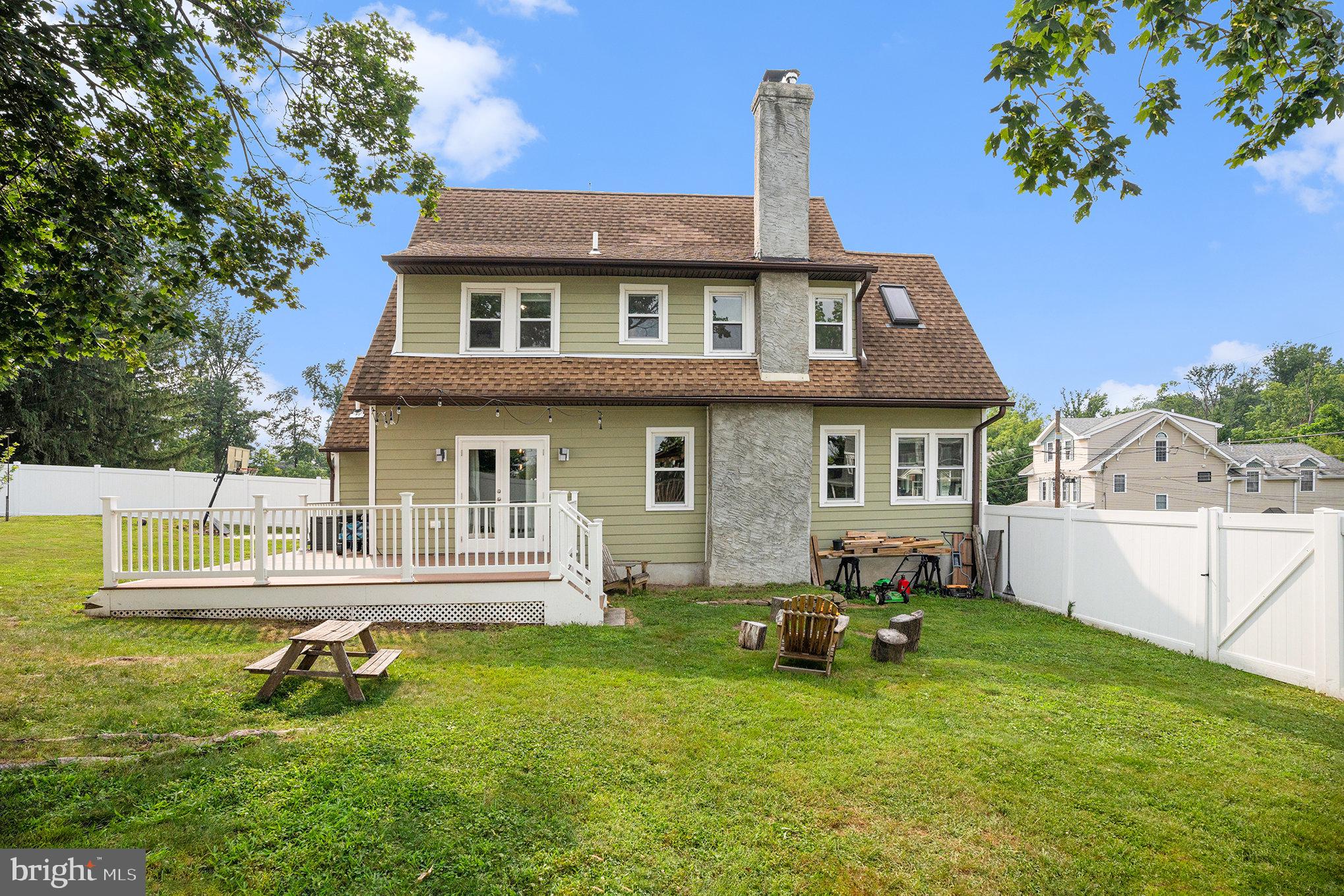 7238 Hollywood Road Fort Washington, PA 19034 - Photo 23 of 27 a front view of a house with a garden and yard