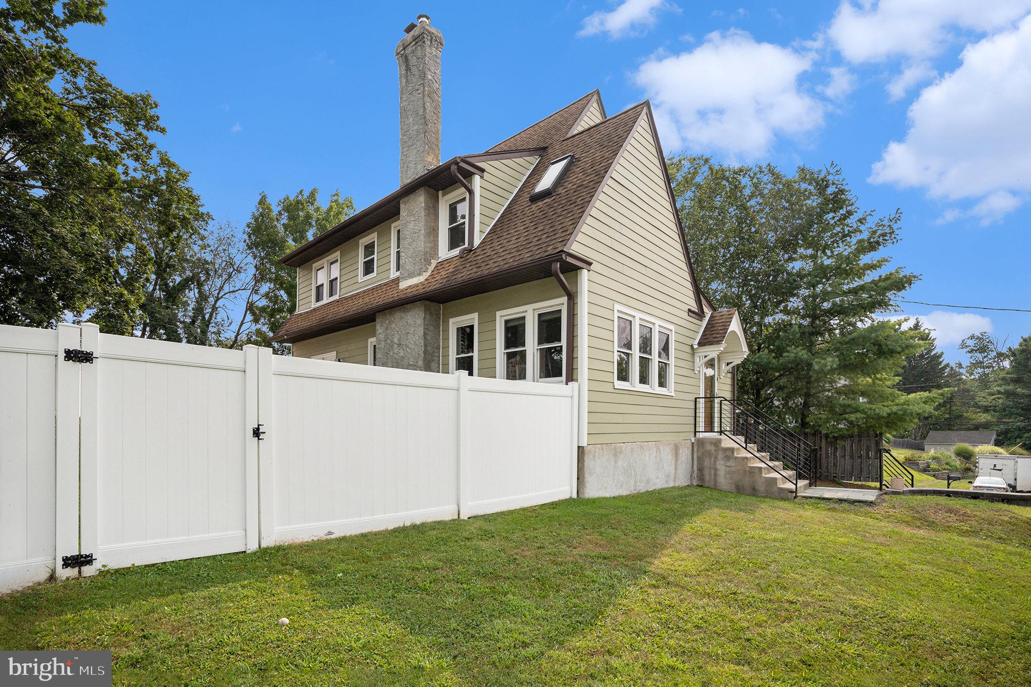 7238 Hollywood Road Fort Washington, PA 19034 - Photo 24 of 27 a view of a house with a yard
