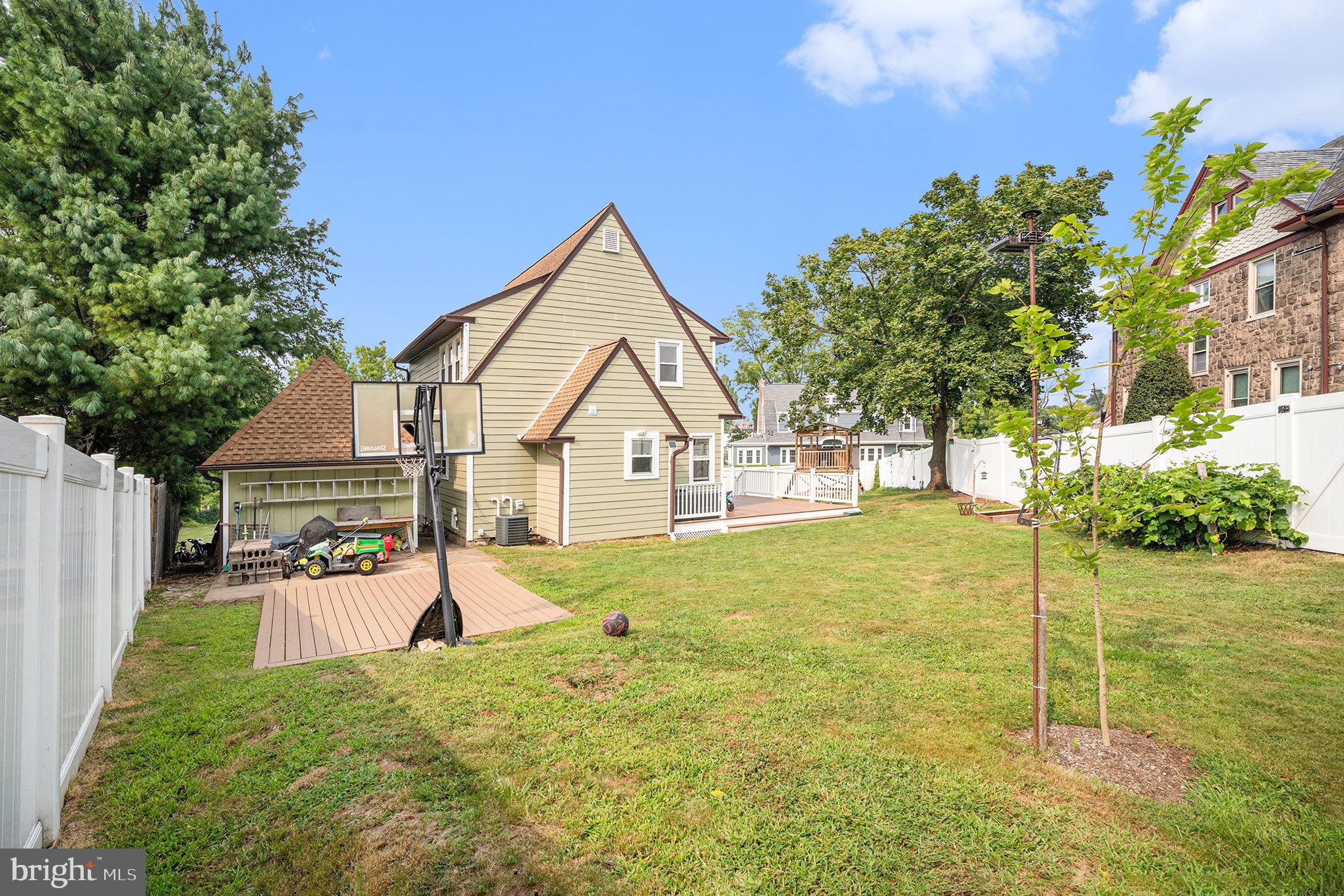 7238 Hollywood Road Fort Washington, PA 19034 - Photo 25 of 27 a view of a house with backyard and tree