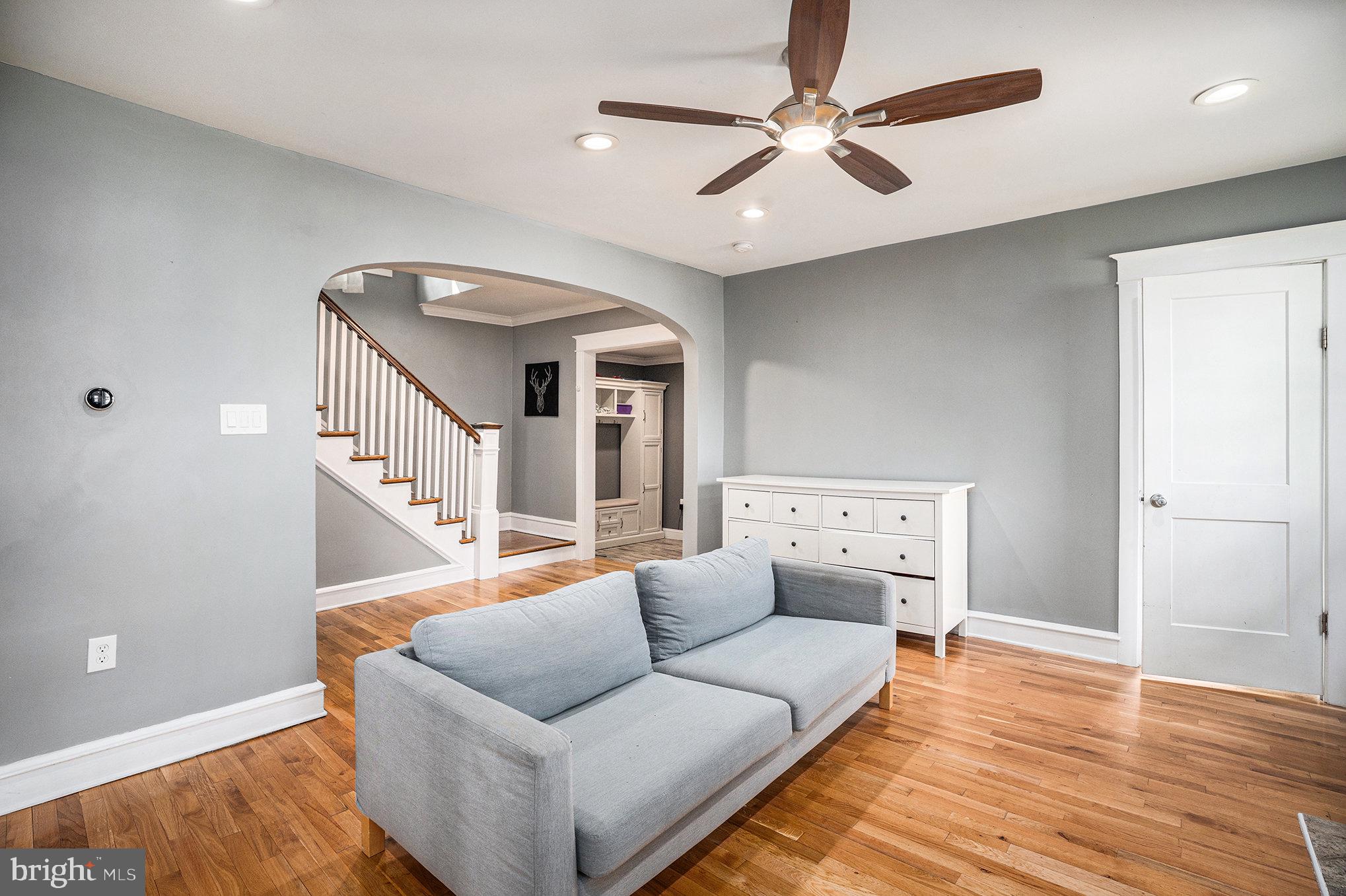 7238 Hollywood Road Fort Washington, PA 19034 - Photo 5 of 27 a living room with furniture and a ceiling fan