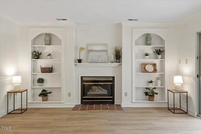a view of livingroom with furniture and fireplace