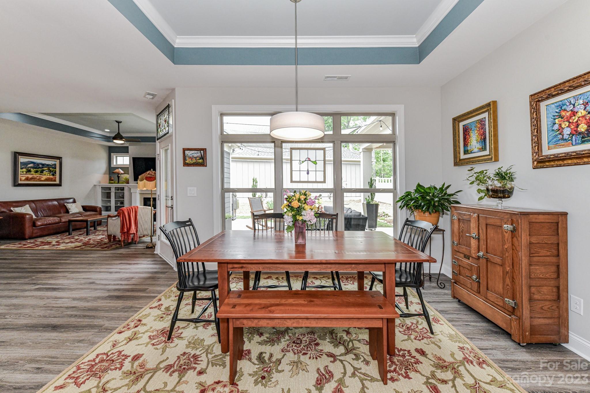 2330 Wesley Landing Road Waxhaw, NC 28173 - Photo 18 of 47 a view of a dining room with furniture window and wooden floor