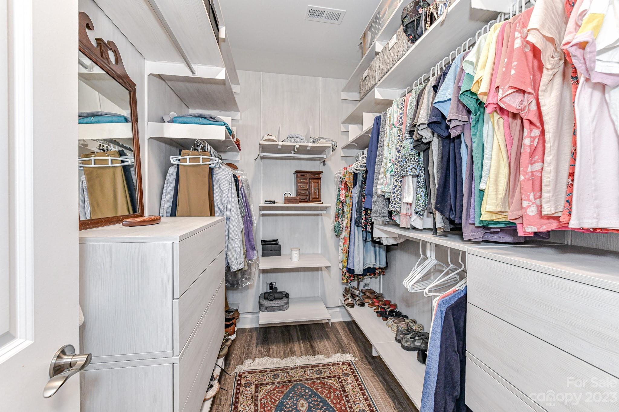 2330 Wesley Landing Road Waxhaw, NC 28173 - Photo 28 of 47 a view of walk in closet with clothes and shoes