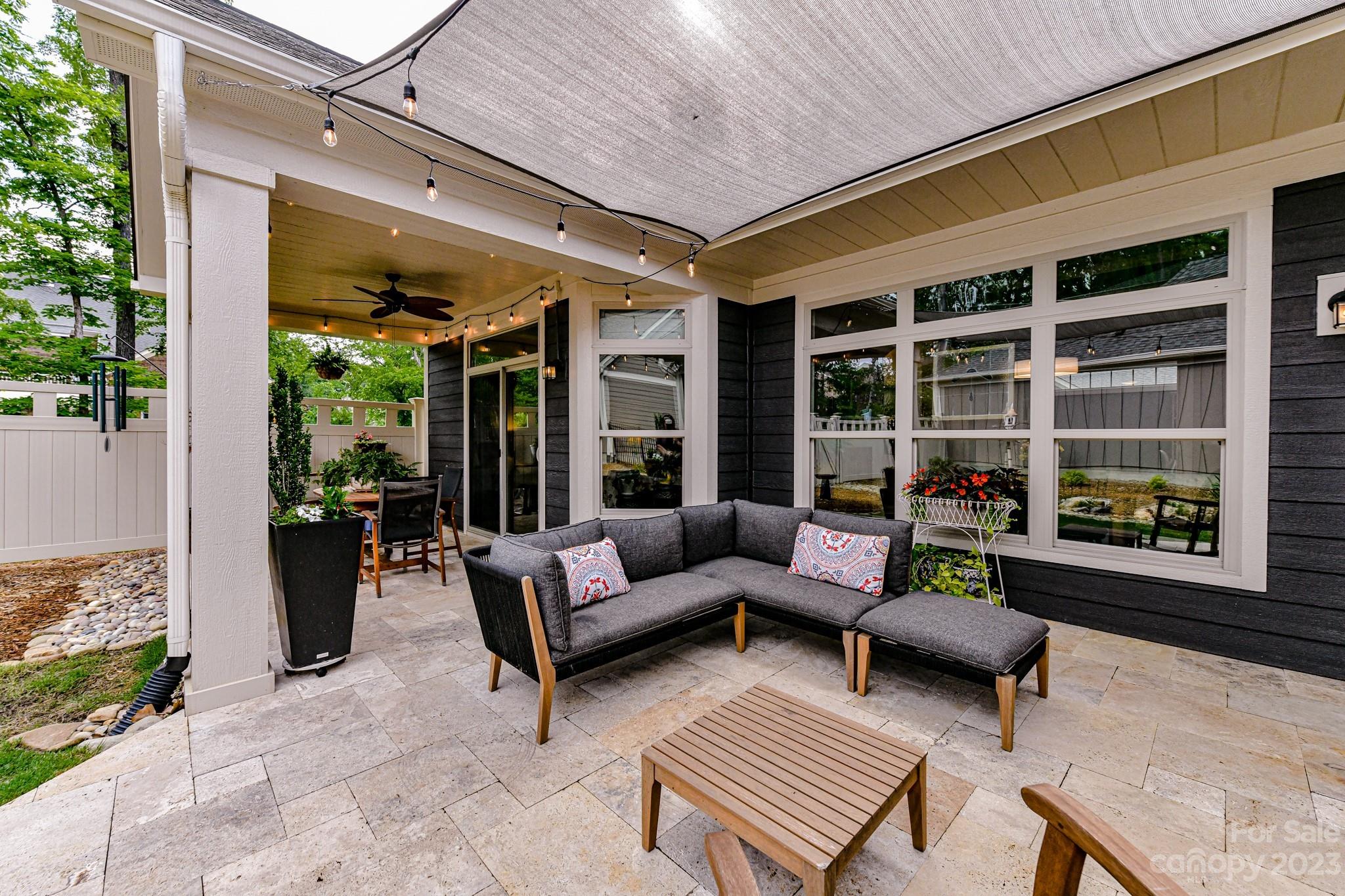 2330 Wesley Landing Road Waxhaw, NC 28173 - Photo 35 of 47 a outdoor living space with furniture and a potted plant