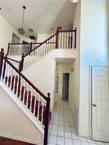 a view of front door with stairs