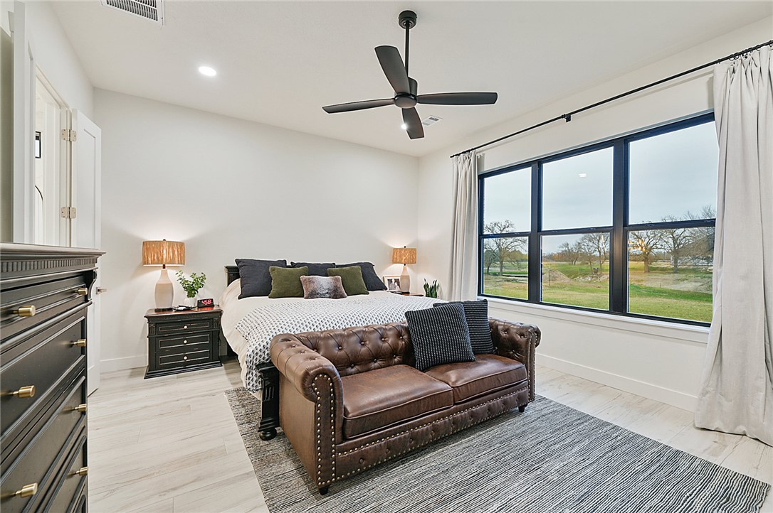 10704 Harvey Ranch Road College Station, TX 77845 - Photo 17 of 18 a living room with furniture and a large window