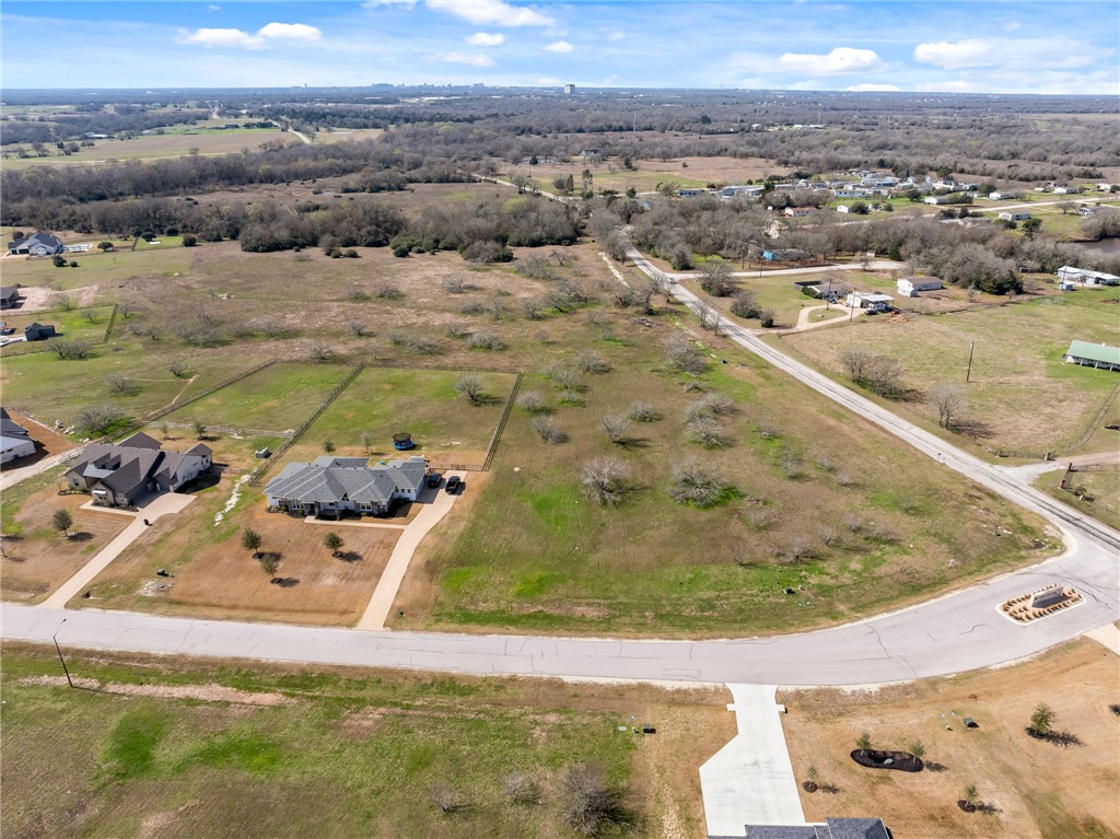 10704 Harvey Ranch Road College Station, TX 77845 - Photo 5 of 18 an aerial view of residential houses with outdoor space