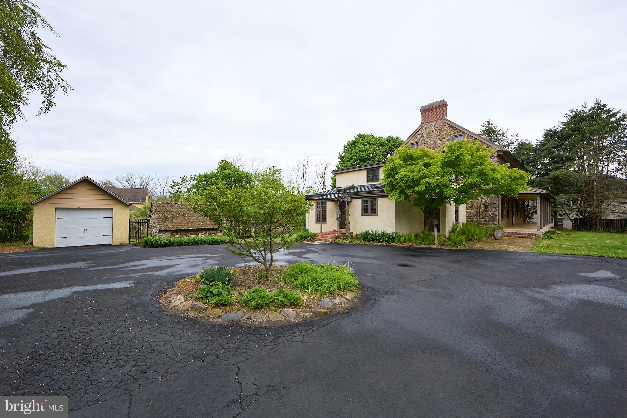 702 Lenape Road West Chester, PA 19382 - Photo 43 of 61 Garage and circular driveway
