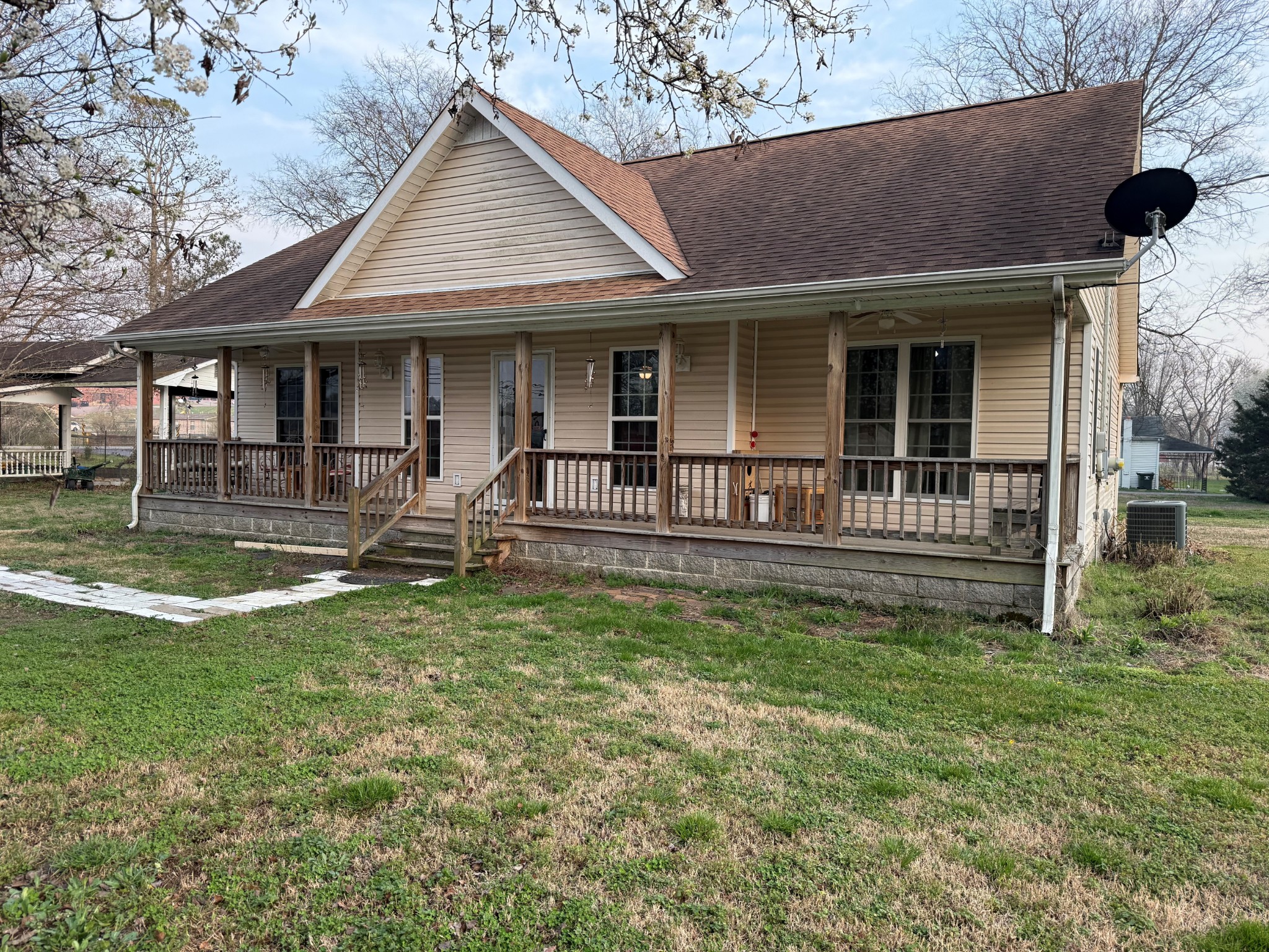 7719 Elkton Pike Prospect, TN 38477 - Photo 1 of 17 a front view of a house with garden