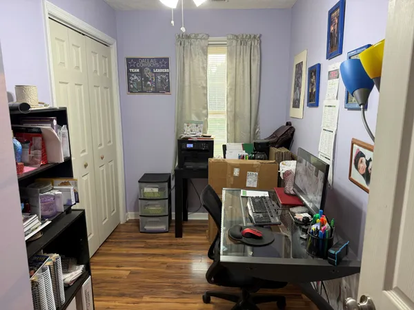 a room with furniture and wooden floor