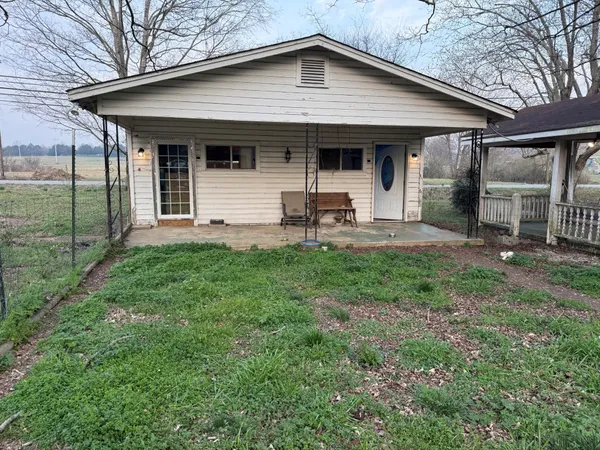 a front view of a house with patio