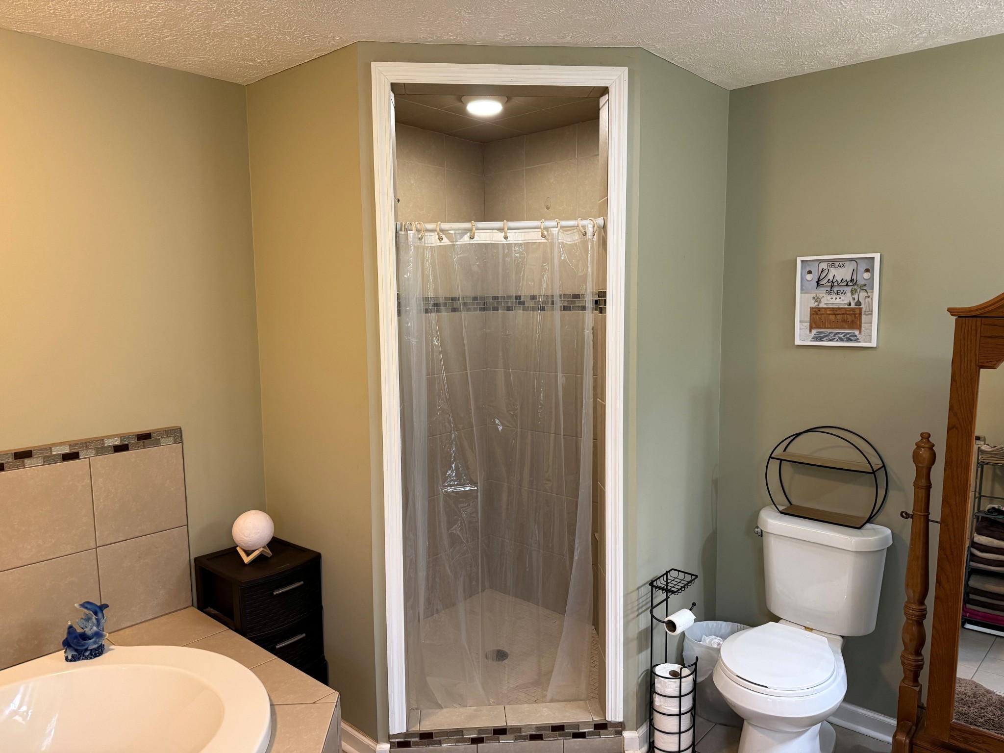 7719 Elkton Pike Prospect, TN 38477 - Photo 8 of 17 a bathroom with a toilet and a shower