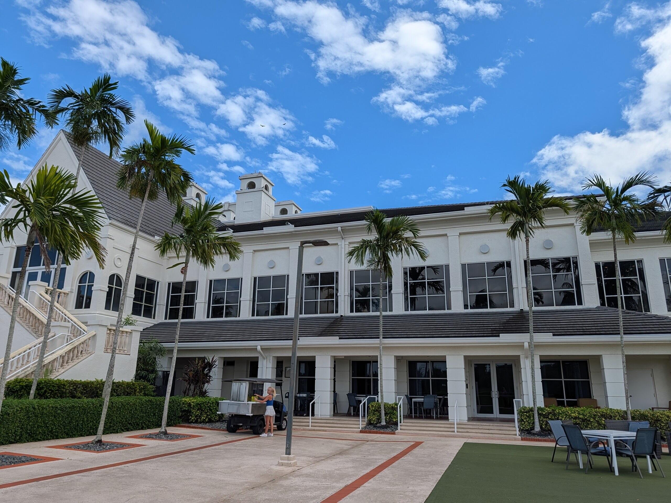17372 Boca Club Boulevard, Unit 405 Boca Raton, FL 33487 - Photo 67 of 74 front view of a building with a garden