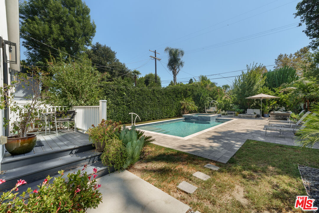 11202 Kling Street North Hollywood, CA 91602 - Photo 14 of 18 a view of a backyard with plants and outdoor seating