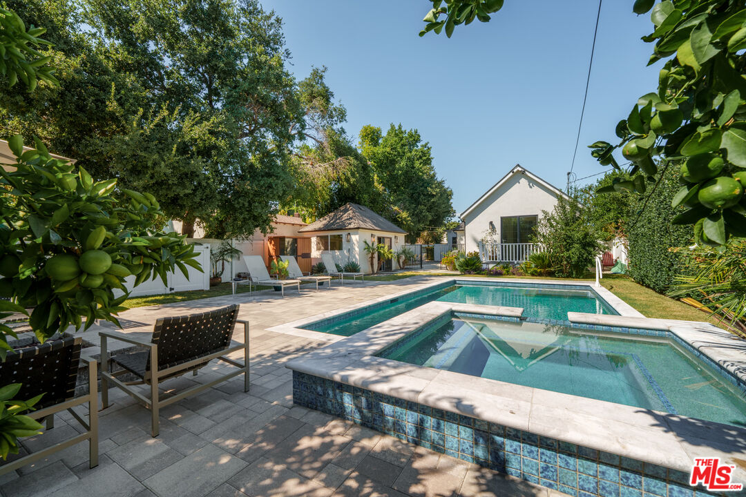 11202 Kling Street North Hollywood, CA 91602 - Photo 15 of 18 a view of swimming pool with chairs