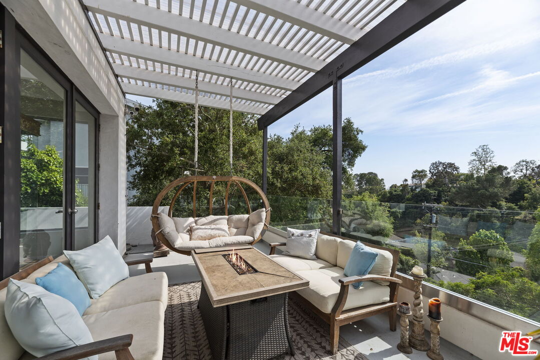 641 Walther Way Los Angeles, CA 90049 - Photo 21 of 53 a view of a patio on the roof deck