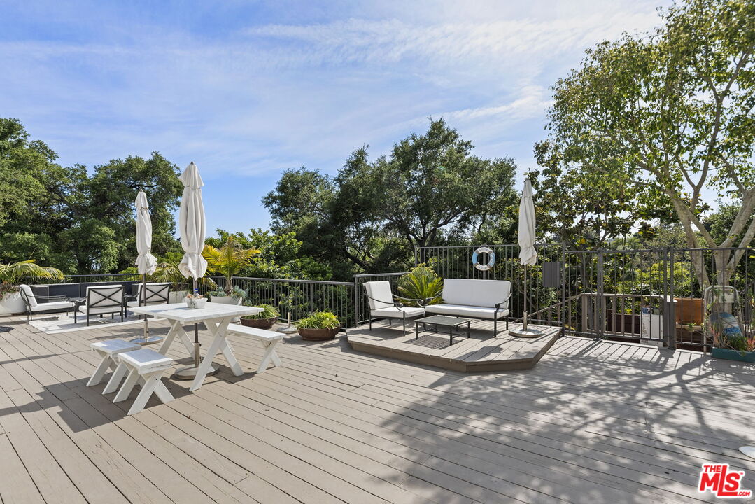 641 Walther Way Los Angeles, CA 90049 - Photo 41 of 53 a view of a lounge chairs on the roof deck