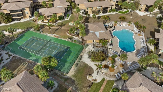 an aerial view of a house with outdoor space