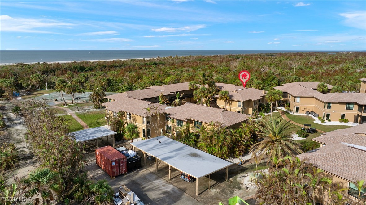 5117 Sea Bell Road, Unit G205 Sanibel, FL 33957 - Photo 25 of 31 an aerial view of a house with a garden