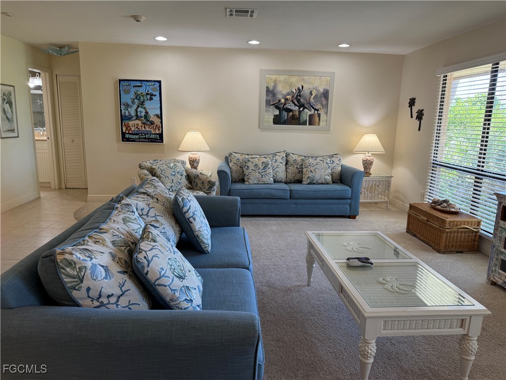 5117 Sea Bell Road, Unit G205 Sanibel, FL 33957 - Photo 4 of 31 a living room with furniture and a couch