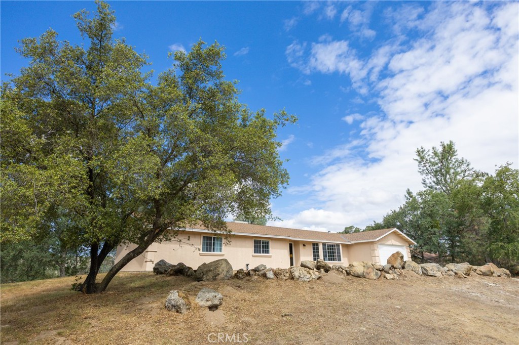 30142 Revis Road Coarsegold, CA 93614 - Photo 38 of 43 a view of house with yard and entertaining space