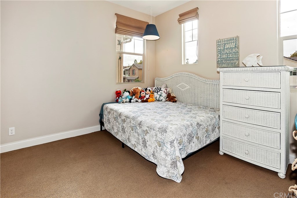 95 Shadowbrook Irvine, CA 92604 - Photo 11 of 23 a bedroom with a bed and a dresser