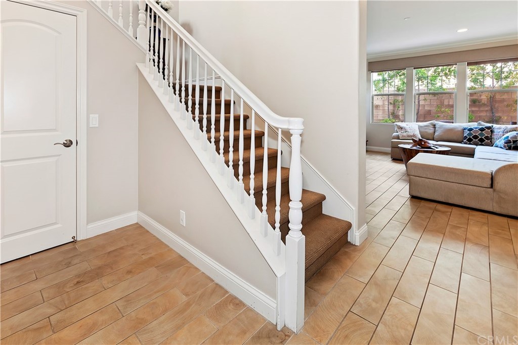 95 Shadowbrook Irvine, CA 92604 - Photo 2 of 23 a view of entryway and hall with wooden floor